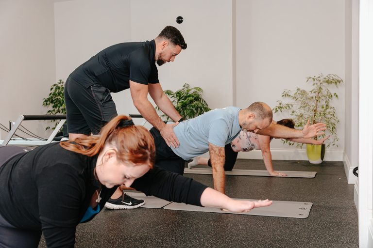 Pilates class stretching