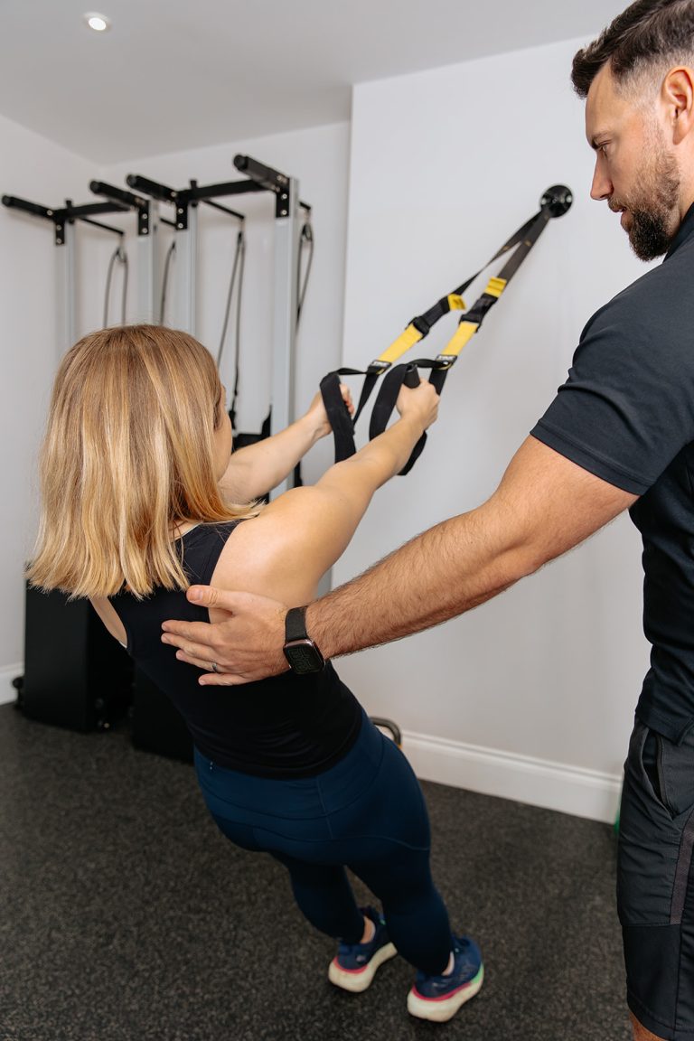 Woman using resistance bands for strength training